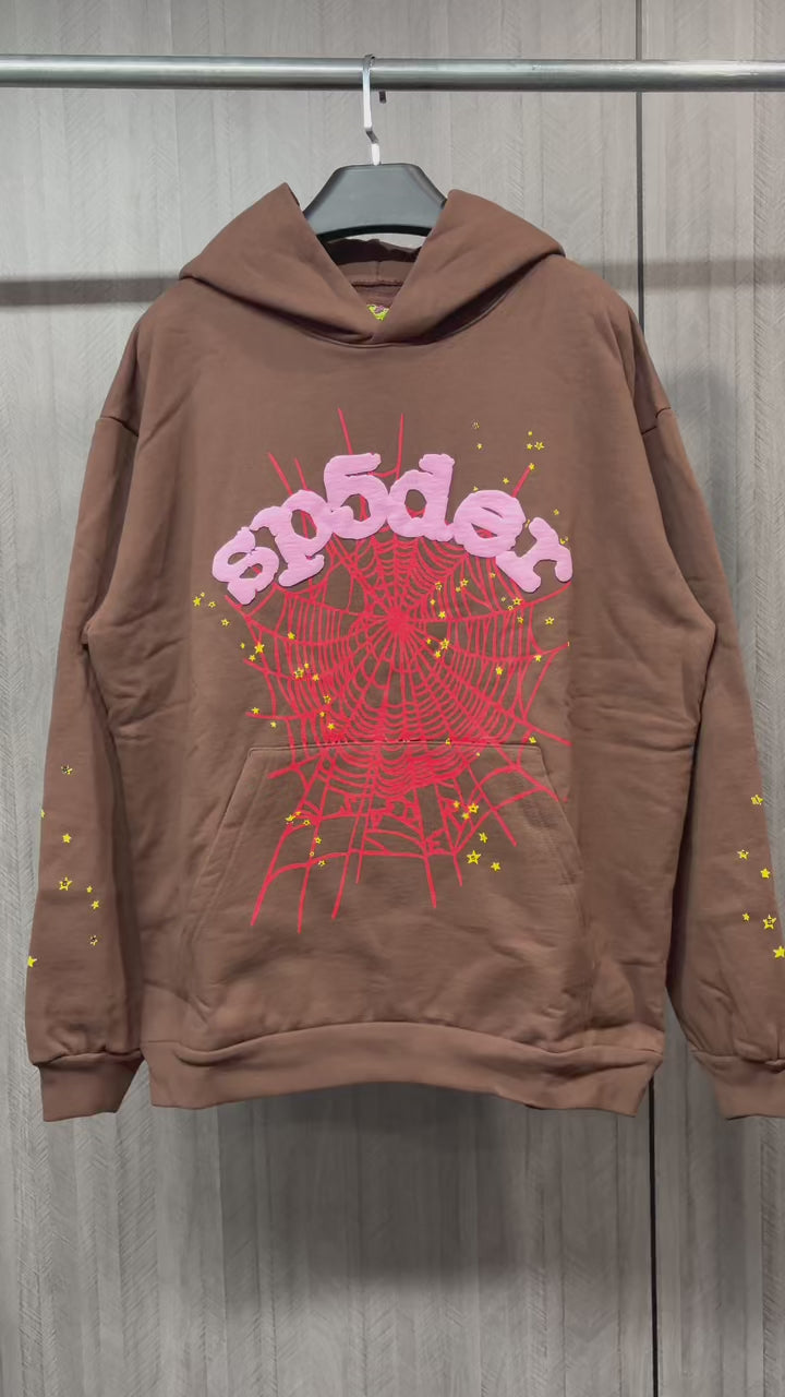 Sp5der Web Hoodie Brown front view with raised pink logo, red spider web and yellow stars